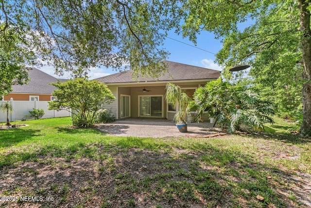 663 Reflection Cove Ct, Jacksonville, FL 32218 - back of property featuring a ceiling fan and a patio area