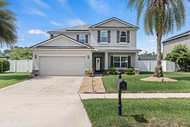 4008 Cormorant Ln, Middleburg, FL 32068 - traditional home featuring stucco siding, roof mounted solar panels, an attached garage, driveway, and covered porch