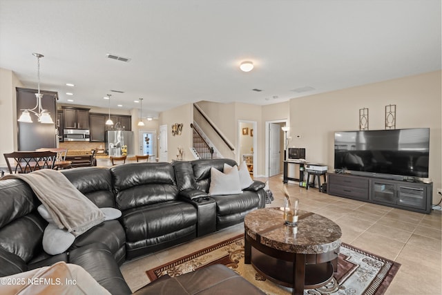 4008 Cormorant Ln, Middleburg, FL 32068 - living area featuring stairs, light tile patterned floors, and recessed lighting