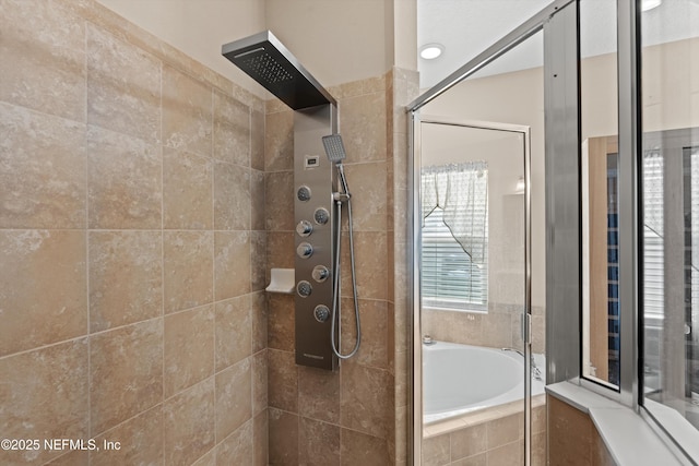 4008 Cormorant Ln, Middleburg, FL 32068 - bathroom with tiled shower and a bath