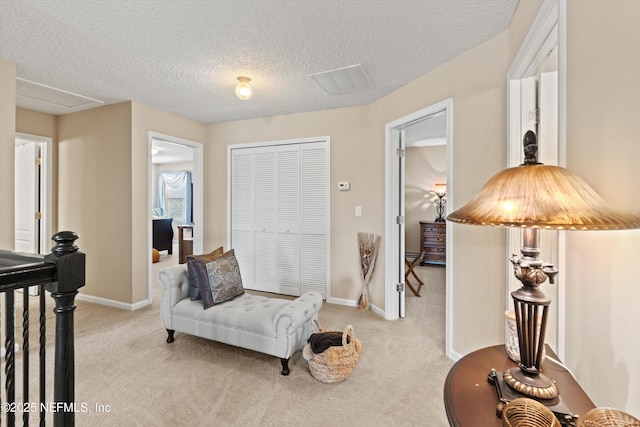 4008 Cormorant Ln, Middleburg, FL 32068 - sitting room featuring light colored carpet, a textured ceiling, and baseboards
