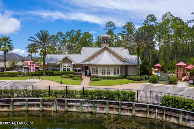 4008 Cormorant Ln, Middleburg, FL 32068 - back of house with metal roof and a water view