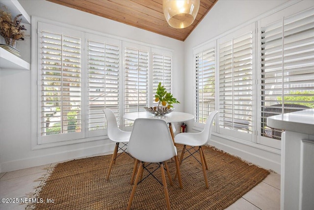 188 Sea Hammock Way Unit 188, Ponte Vedra Beach, FL 32082 - tiled dining room with vaulted ceiling, wooden ceiling, healthy amount of natural light, and baseboards