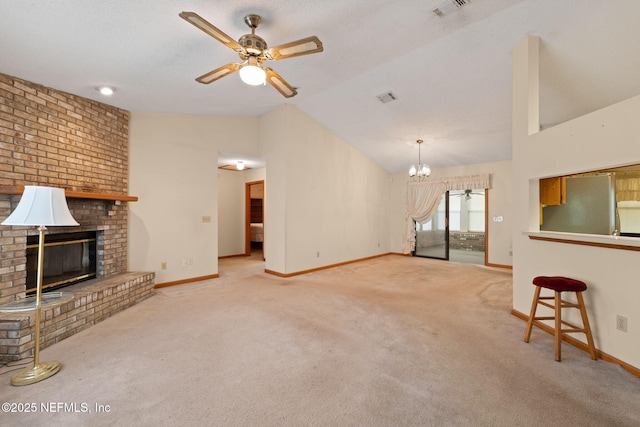 2658 Apache Ct, Middleburg, FL 32068 - unfurnished living room with ceiling fan, lofted ceiling, carpet flooring, a brick fireplace, and baseboards