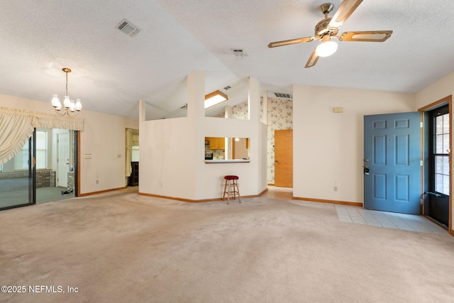 2658 Apache Ct, Middleburg, FL 32068 - unfurnished living room featuring vaulted ceiling, carpet, baseboards, a textured ceiling, and ceiling fan