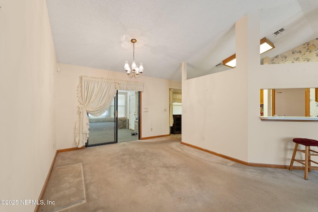 2658 Apache Ct, Middleburg, FL 32068 - unfurnished room featuring vaulted ceiling, carpet flooring, baseboards, and a chandelier
