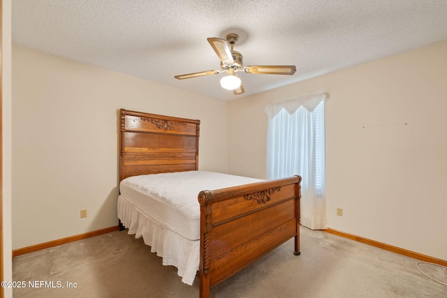 2658 Apache Ct, Middleburg, FL 32068 - carpeted bedroom featuring baseboards, a textured ceiling, and a ceiling fan