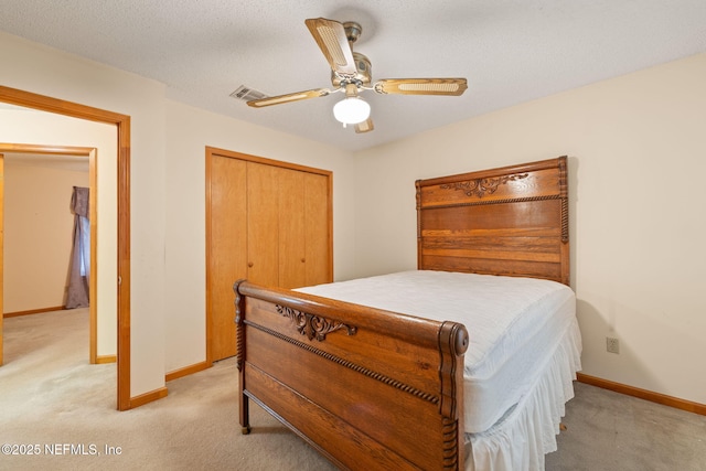 2658 Apache Ct, Middleburg, FL 32068 - bedroom with light carpet, a closet, and baseboards