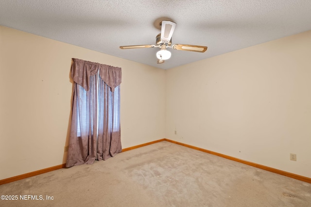 2658 Apache Ct, Middleburg, FL 32068 - spare room featuring carpet, baseboards, and a ceiling fan