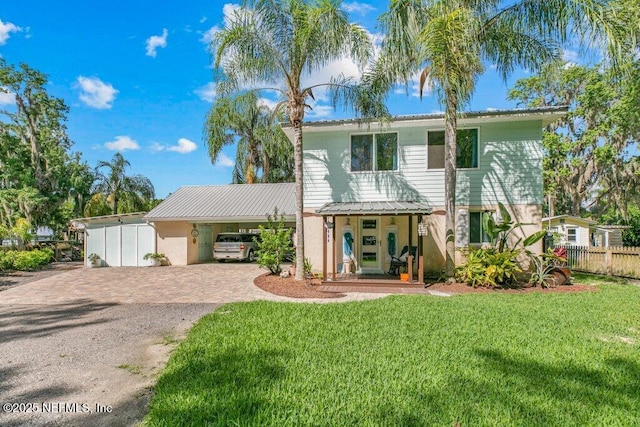 8211 Colee Cove Branch Rd Unit G, Saint Augustine, FL 32092 - view of front of property featuring driveway, a porch, a carport, and metal roof