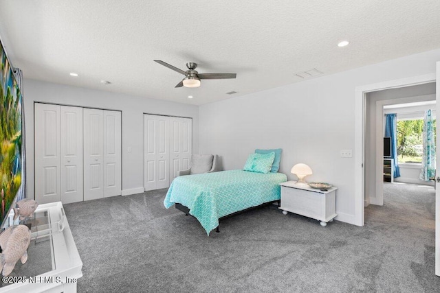 8211 Colee Cove Branch Rd Unit G, Saint Augustine, FL 32092 - bedroom with carpet floors, multiple closets, a textured ceiling, recessed lighting, and baseboards