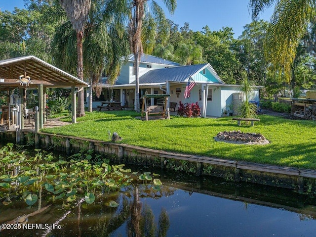 8211 Colee Cove Branch Rd Unit G, Saint Augustine, FL 32092 - back of property with a lawn, metal roof, and a water view