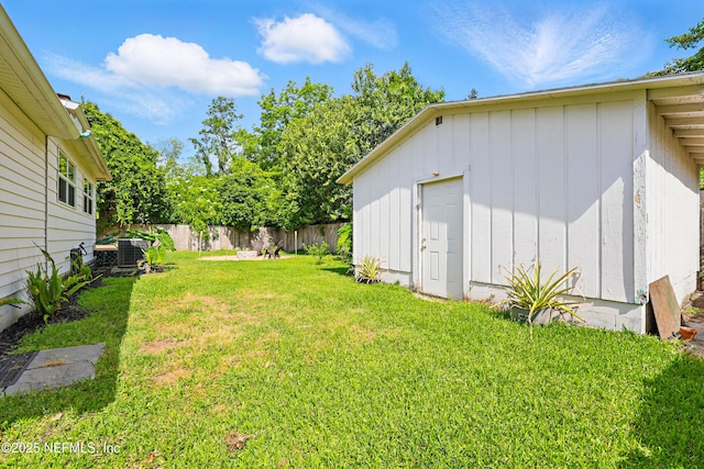 5327 Attleboro St, Jacksonville, FL 32205 - view of yard with central AC and an outbuilding