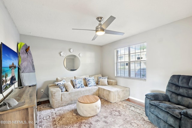 1101 Kettering Way, Orange Park, FL 32073 - living room with baseboards, wood finished floors, and ceiling fan