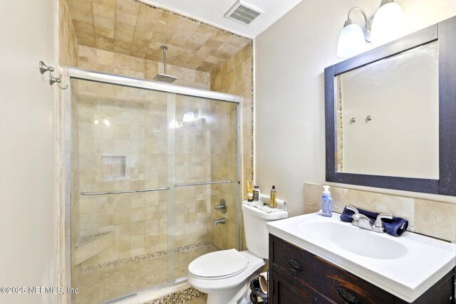 1101 Kettering Way, Orange Park, FL 32073 - full bathroom featuring a shower stall, vanity, and toilet