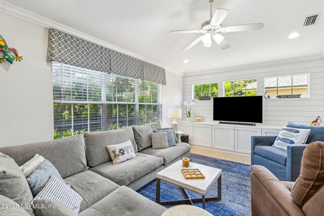 2738 Sea Grove Ln, Fernandina Beach, FL 32034 - living room with crown molding, ceiling fan, and recessed lighting