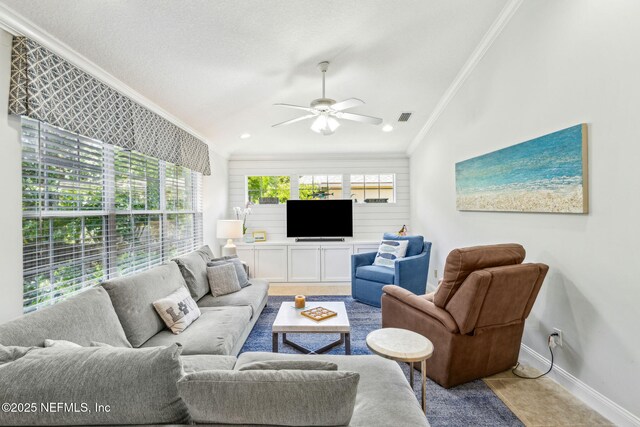 2738 Sea Grove Ln, Fernandina Beach, FL 32034 - living room featuring ornamental molding, ceiling fan, and baseboards