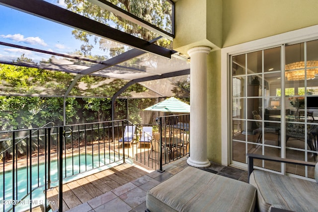 2738 Sea Grove Ln, Fernandina Beach, FL 32034 - view of patio featuring glass enclosure and a jacuzzi