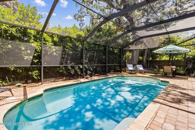 2738 Sea Grove Ln, Fernandina Beach, FL 32034 - view of pool with a patio area, a lanai, and a fenced backyard