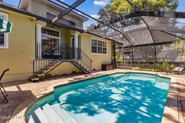 2738 Sea Grove Ln, Fernandina Beach, FL 32034 - view of pool featuring a patio, glass enclosure, and a ceiling fan