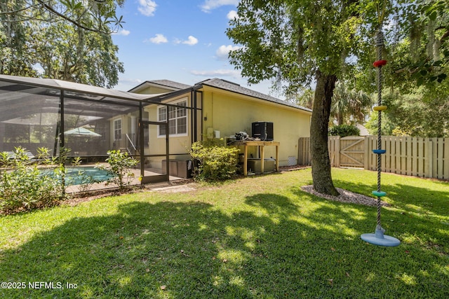 2738 Sea Grove Ln, Fernandina Beach, FL 32034 - rear view of property featuring stucco siding and a gate