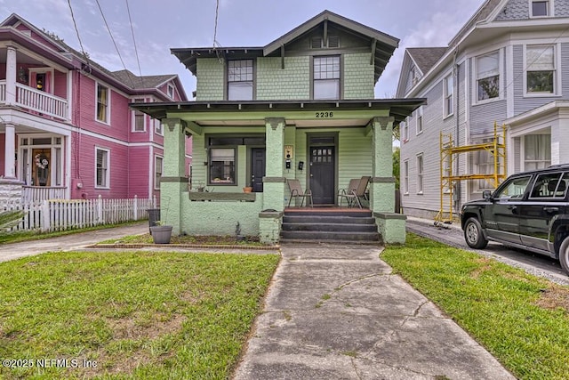 2236 Post St, Jacksonville, FL 32204 - american foursquare style home with a porch