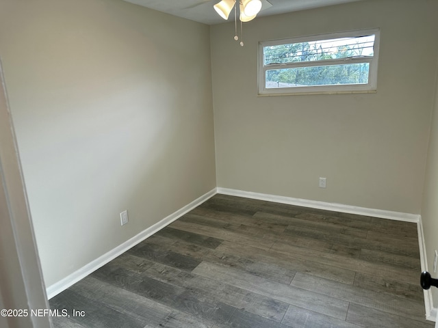234 Canis St W, Orange Park, FL 32073 - empty room with a ceiling fan, dark wood-style flooring, and baseboards