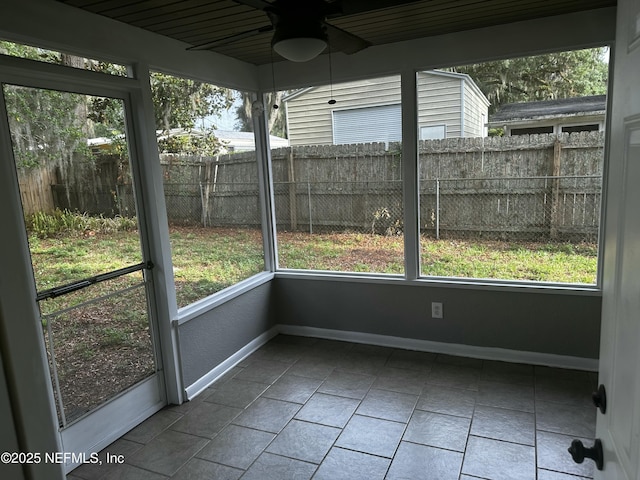 234 Canis St W, Orange Park, FL 32073 - unfurnished sunroom with ceiling fan and plenty of natural light