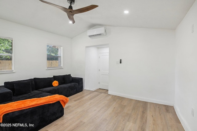 7345 Penrose St, Jacksonville, FL 32208 - living area with an AC wall unit, lofted ceiling, light wood-type flooring, healthy amount of natural light, and ceiling fan
