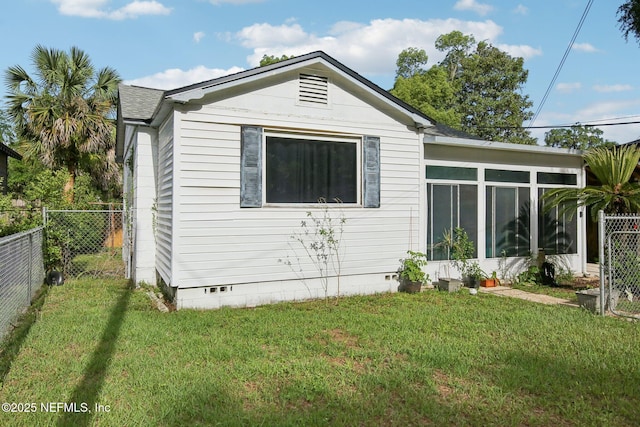 7345 Penrose St, Jacksonville, FL 32208 - back of property with crawl space and a sunroom