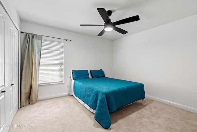 129 Lake Run Blvd, Jacksonville, FL 32218 - carpeted bedroom with baseboards, ceiling fan, and a closet