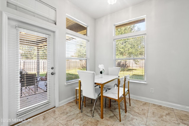 129 Lake Run Blvd, Jacksonville, FL 32218 - tiled dining space with baseboards