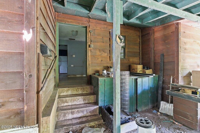 8563 Moncrief-Dinsmore Rd, Jacksonville, FL 32219 - stairs featuring wood walls