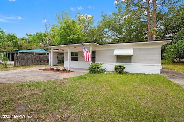 3930 Cottonwood Ln, Jacksonville, FL 32207 - mid-century modern home with brick siding and driveway