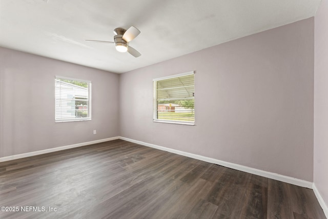 3930 Cottonwood Ln, Jacksonville, FL 32207 - unfurnished room featuring baseboards, dark wood-style flooring, and ceiling fan