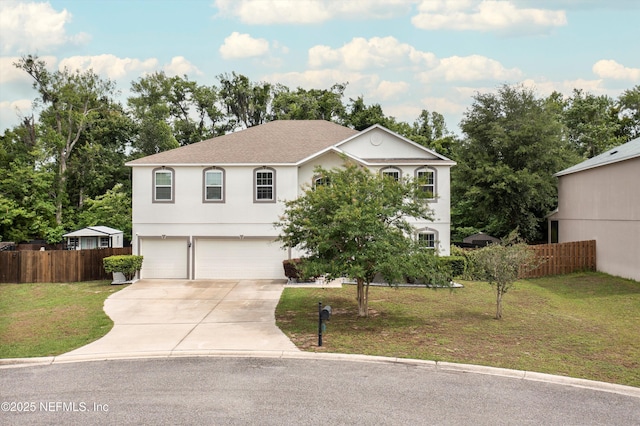 97054 Huntington Ct, Yulee, FL 32097 - view of front of property featuring a garage, driveway, and stucco siding