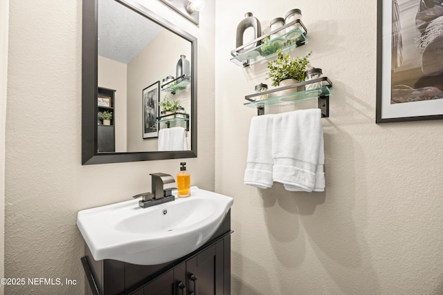 97054 Huntington Ct, Yulee, FL 32097 - bathroom featuring vanity and a textured wall