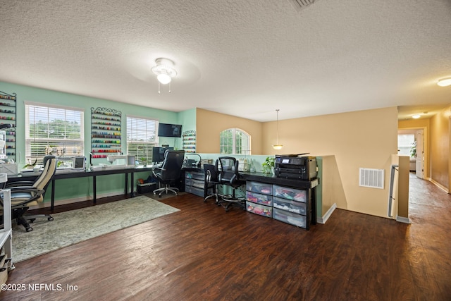 97054 Huntington Ct, Yulee, FL 32097 - home office with wood finished floors, a textured ceiling, a ceiling fan, and baseboards