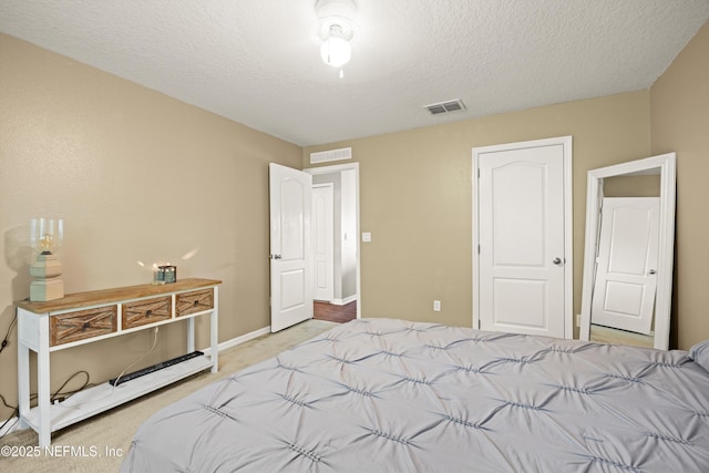 97054 Huntington Ct, Yulee, FL 32097 - bedroom with carpet floors, a textured ceiling, and baseboards