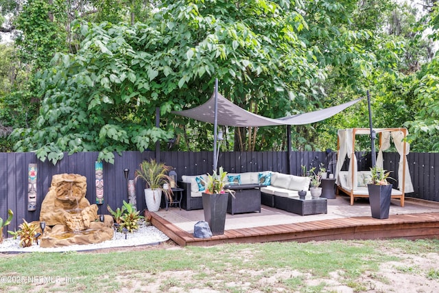 97054 Huntington Ct, Yulee, FL 32097 - wooden terrace with outdoor lounge area and a fenced backyard