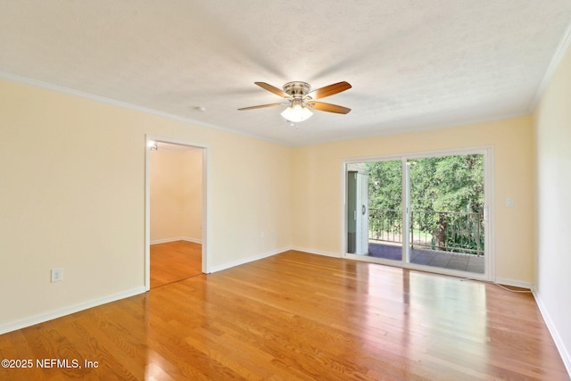 5201 Atlantic Blvd Unit 142, Jacksonville, FL 32207 - empty room with ceiling fan, wood finished floors, crown molding, and baseboards