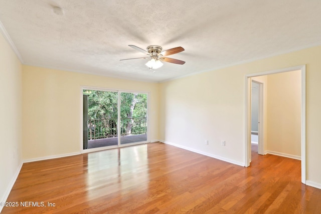 5201 Atlantic Blvd Unit 142, Jacksonville, FL 32207 - unfurnished room featuring ceiling fan, wood finished floors, crown molding, baseboards, and a textured ceiling