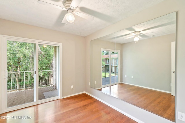 5201 Atlantic Blvd Unit 142, Jacksonville, FL 32207 - unfurnished room featuring a ceiling fan, wood finished floors, baseboards, and a textured ceiling