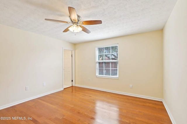 5201 Atlantic Blvd Unit 142, Jacksonville, FL 32207 - unfurnished room featuring wood finished floors, a textured ceiling, baseboards, and a ceiling fan