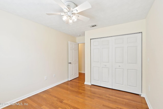 5201 Atlantic Blvd Unit 142, Jacksonville, FL 32207 - unfurnished bedroom featuring light wood-style floors, baseboards, and a closet