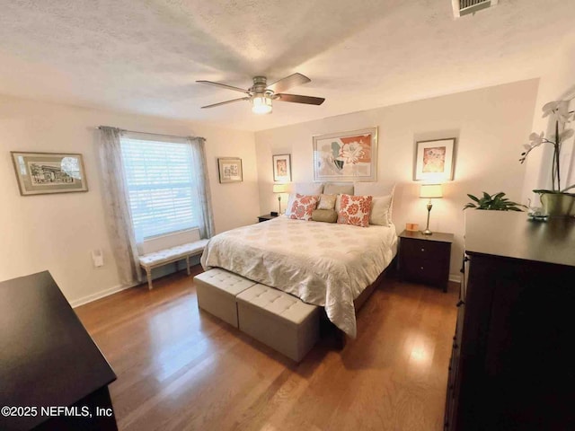 5201 Atlantic Blvd Unit 142, Jacksonville, FL 32207 - bedroom with wood finished floors, baseboards, and ceiling fan