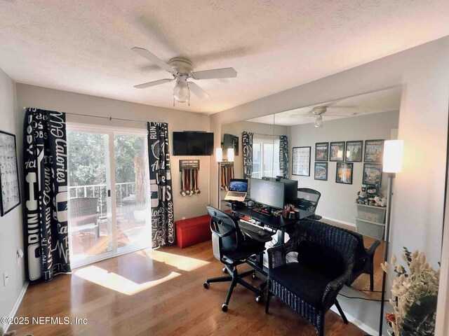 5201 Atlantic Blvd Unit 142, Jacksonville, FL 32207 - office with a ceiling fan, wood finished floors, healthy amount of natural light, and a textured ceiling
