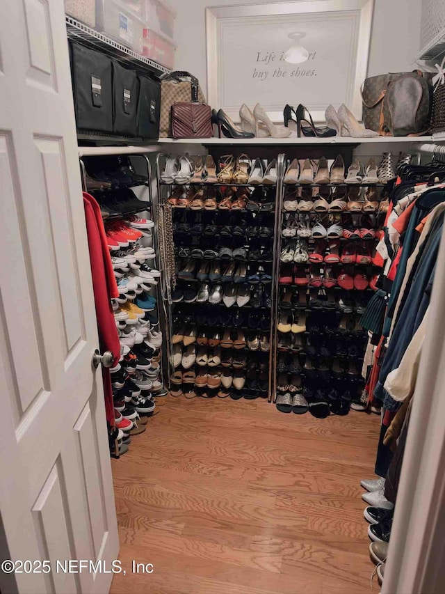 5201 Atlantic Blvd Unit 142, Jacksonville, FL 32207 - walk in closet featuring wood finished floors