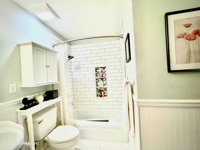 5201 Atlantic Blvd Unit 142, Jacksonville, FL 32207 - bathroom featuring a wainscoted wall, toilet, and bathing tub / shower combination