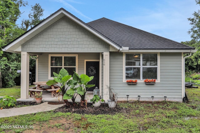 616 Osman Rd, Jacksonville, FL 32225 - bungalow-style house with roof with shingles and a porch